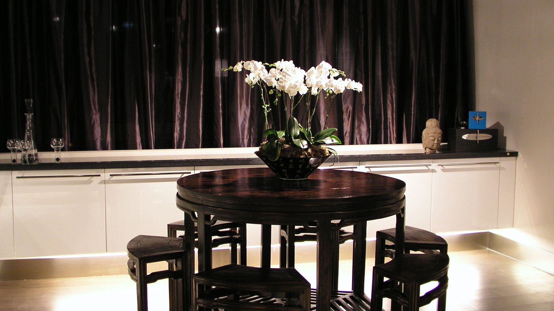 Dining area with curtain backdrop